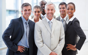 Business people standing smiling